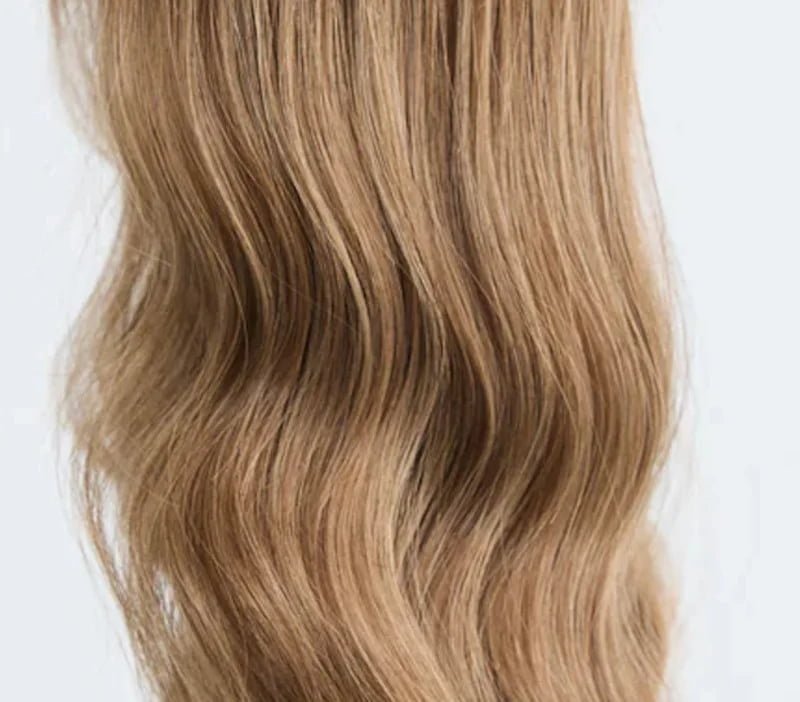 100% virgin human hair showing silky texture and natural movement