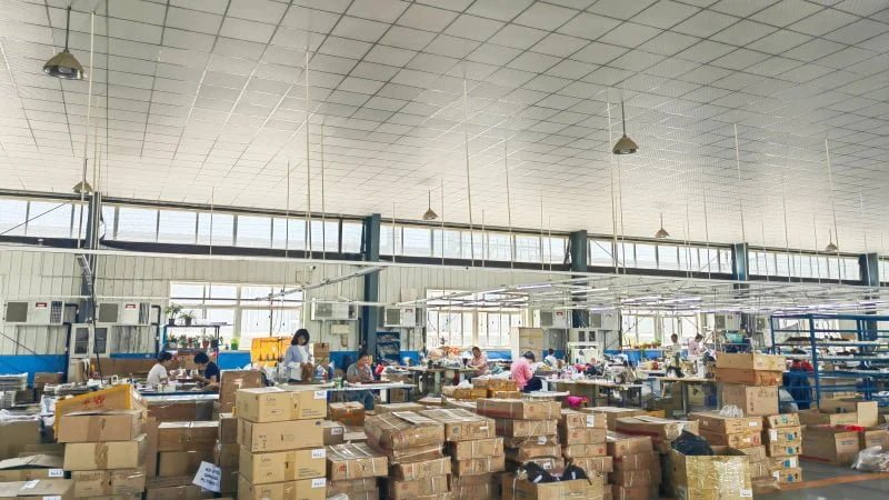 Lace wig bulk production facility with organized workstations