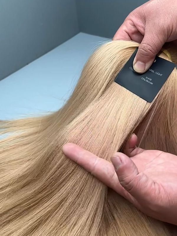 Human Hair Cuticle Quality Close-up shot of hair strands showing healthy cuticles under a magnifying glass, demonstrating high-quality human hair for a wig.