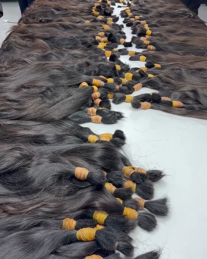 human hair wig manufacturer factory floor showcasing premium raw materials